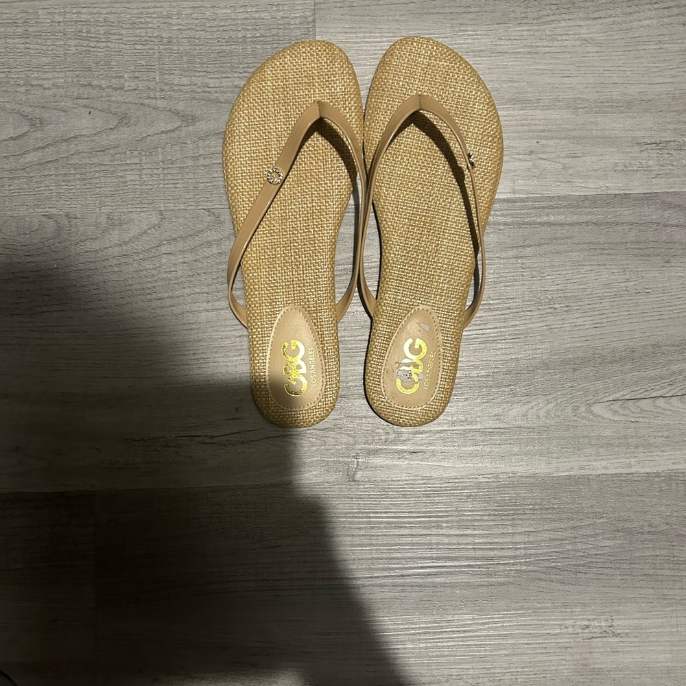 Beige flip flops